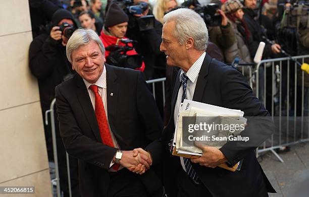 German Transport Minister Peter Ramsauer and Hesse Governor Volker Bouffier arrive for coalition negotaitons between the German Christian Democrats,...