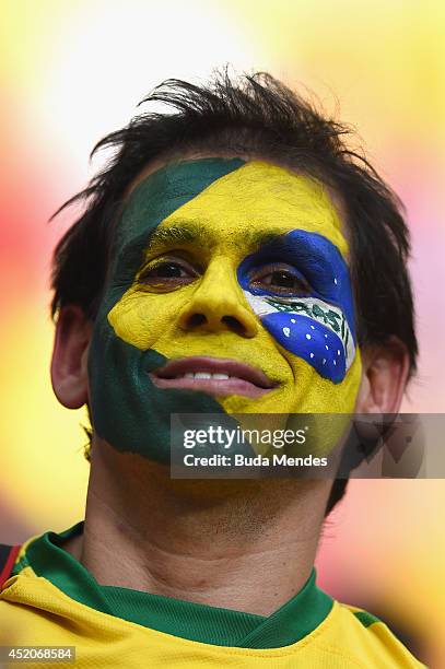 Brazil fan enjoys the atmosphere prior to the 2014 FIFA World Cup Brazil Third Place Playoff match between Brazil and the Netherlands at Estadio...