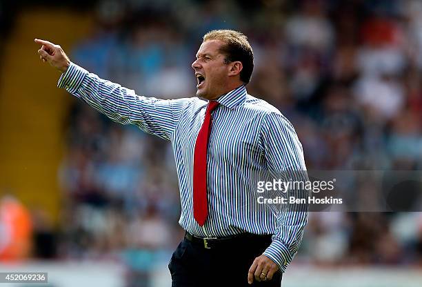 Stevenage manager Graham Westley shouts instructions during the Pre Season Friendly match between Stevenage and West Ham United at The Lamex Stadium...