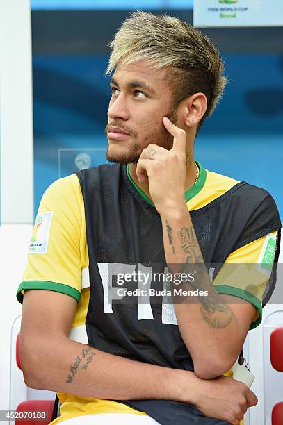 An injured Neymar of Brazil looks on from the bench during the 2014 FIFA World Cup Brazil Third Place Playoff match between Brazil and the...