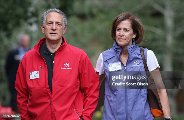 Daniel Doctoroff, chief executive officer of Bloomberg LP, walks with Alisa Doctoroff as they attend the annual Allen and Company Sun Valley...