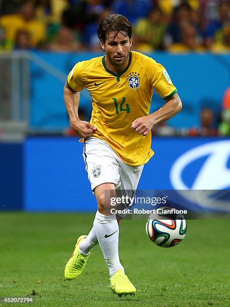 Maxwell of Brazil controls the ball during the 2014 FIFA World Cup Brazil Third Place Playoff match between Brazil and the Netherlands at Estadio...