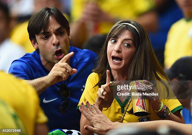 Fans react in the crowd during the 2014 FIFA World Cup Brazil Third Place Playoff match between Brazil and the Netherlands at Estadio Nacional on...