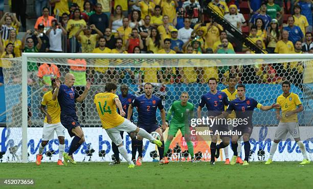 Maxwell of Brazil in action during the 2014 FIFA World Cup Brazil Third Place Playoff match between Brazil and the Netherlands at Estadio Nacional in...
