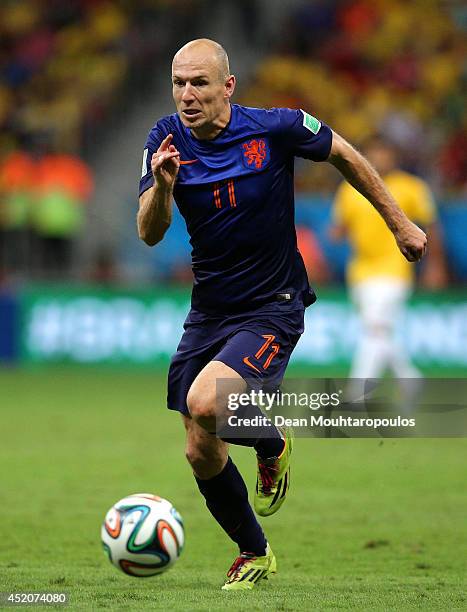 Arjen Robben of the Netherlands controls the ball during the 2014 FIFA World Cup Brazil Third Place Playoff match between Brazil and the Netherlands...