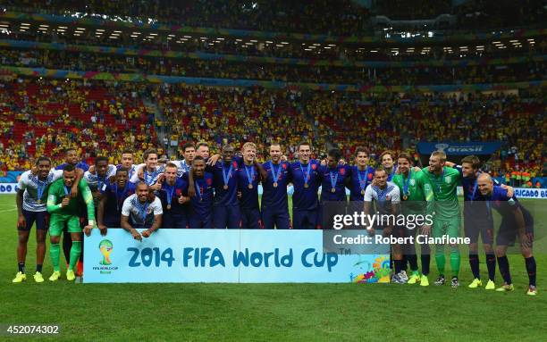 The Netherlands celebrate with their medals after defeating Brazil 3-0 in the 2014 FIFA World Cup Brazil Third Place Playoff match between Brazil and...