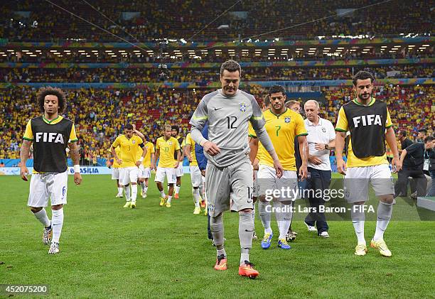 Julio Cesar and players of Brazil walk off the pitch after the 2014 FIFA World Cup Brazil 3rd Place Playoff match between Brazil and Netherlands at...