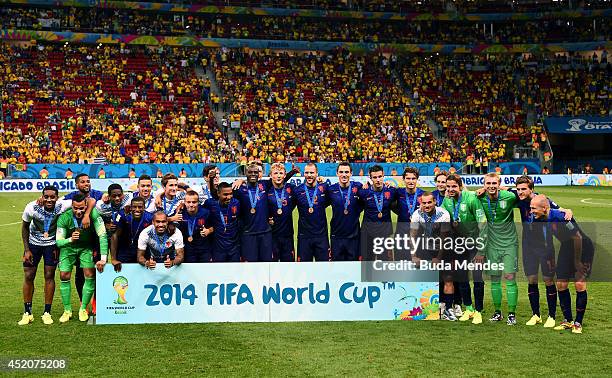 The Netherlands celebrate with their medals after defeating Brazil 3-0 in the 2014 FIFA World Cup Brazil Third Place Playoff match between Brazil and...