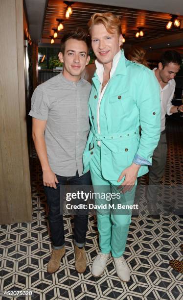 Kevin McHale and Henry Conway attend Henry Conway's birthday at Pont St Restaurant in the Belgraves Hotel on July 12, 2014 in London, England.