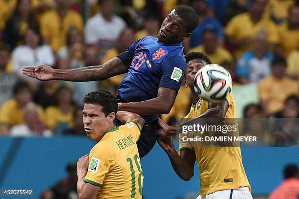 Netherlands' midfielder Georginio Wijnaldum , Brazil's midfielder Willian and Brazil's forward Jo vie during the third place play-off football match...
