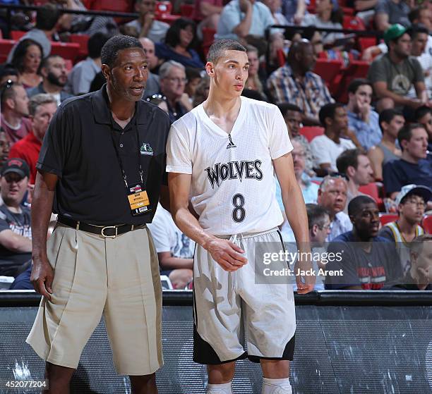 Assistant coach Sam Mitchell of the Minnesota Timberwolves speaks with Zach Lavine against the Dallas Mavericks at the Samsung NBA Summer League 2014...