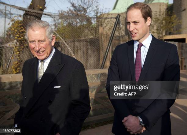 Britain's Prince Charles, Prince of Wales , and his son Prince William, Duke of Cambridge, visit the Zoological Society of London to attend a meeting...