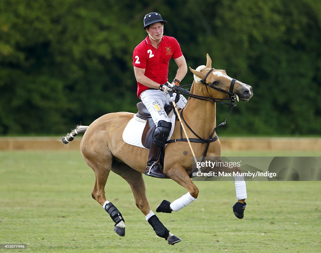 Prince Harry plays in the Army v Navy Rundle Cup Polo Match at... News ...