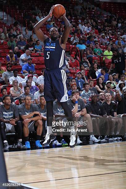 Bernard James of the Dallas Mavericks shoots the ball against the Minnesota Timberwolves at the Samsung NBA Summer League 2014 on July 12, 2014 at...