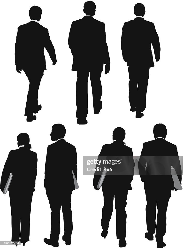 Multiple silhouettes of business people