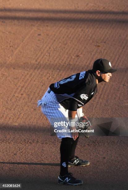 Oscar Robles of Guerreros looks on during a match between Delfines del Carmen and Guerreros de Oaxaca as part of the Mexican Baseball League 2014 at...