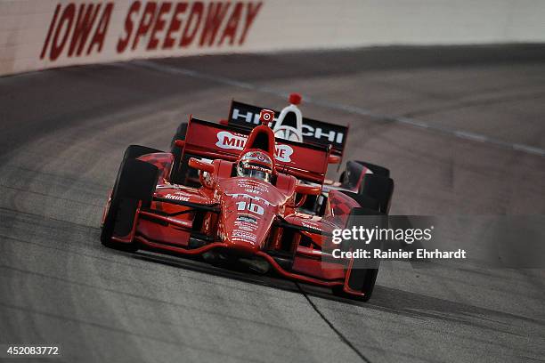 Tony Kanaan of Brazil, driver of the Target Chip Ganassi Racing Dallara Chevrolet, races during the Iowa Corn Indy 300 at Iowa Speedway on July 12,...