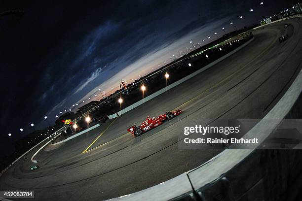 Tony Kanaan of Brazil, driver of the Target Chip Ganassi Racing Dallara Chevrolet, races during the Iowa Corn Indy 300 at Iowa Speedway on July 12,...