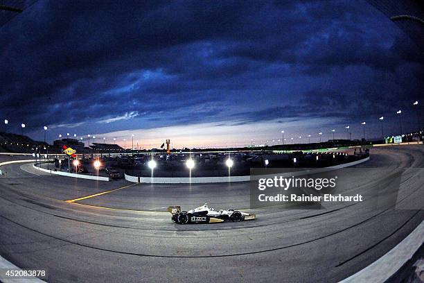 Ed Carpenter, driver of the Fuzzy's Vodka/Ed Carpenter Racing Dallara Chevrolet, races during the Iowa Corn Indy 300 at Iowa Speedway on July 12,...