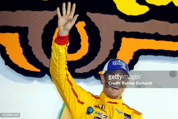 Ryan Hunter-Reay, driver of the DHL Andretti Autosport Dallara Honda, celebrates after winning the Iowa Corn Indy 300 at Iowa Speedway on July 12,...