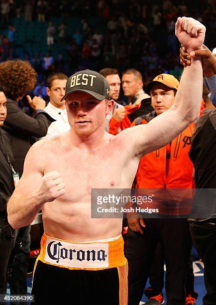 Canelo Alvarez poses after his split-decision victory over Erislandy Lara during their junior middleweight bout at the MGM Grand Garden Arena on July...