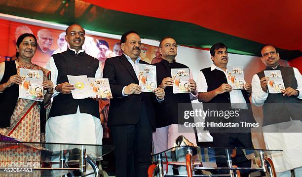Leaders Sushma Swaraj, Vijay Goel, Dr Harshvardhan, Arun Jaitley and Nitin Gadkari during the launch of Party manifesto for upcoming Assembly...