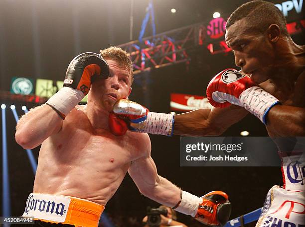 Erislandy Lara lands a right to the head of Canelo Alvarez during their junior middleweight bout at the MGM Grand Garden Arena on July 12, 2014 in...