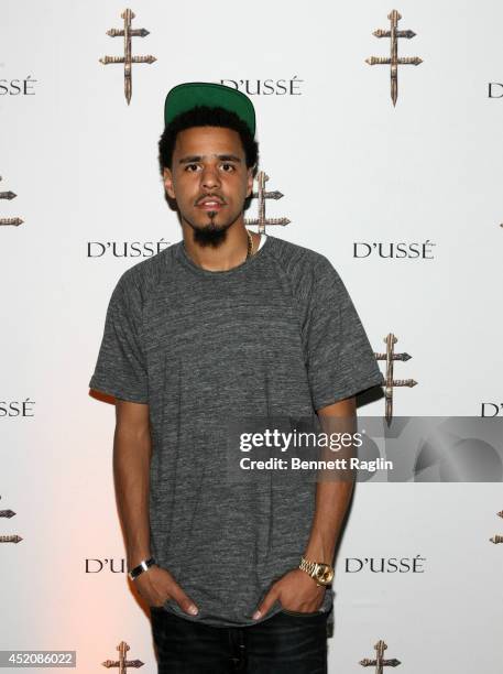 Recording artist J. Cole attends D'USSE VIP Riser + Lounge At On The Run Tour - MetLife Stadium on July 12, 2014 in East Rutherford City.