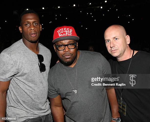Geno Smith, Emery Jones and Brian Axelrod attend D'USSE VIP Riser + Lounge At On The Run Tour - MetLife Stadium on July 12, 2014 in East Rutherford...
