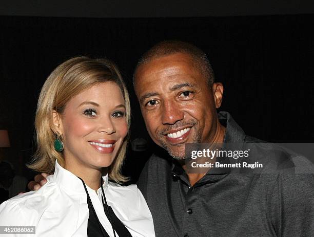 Kevin Liles and wife Erika Jones attend D'USSE VIP Riser + Lounge At On The Run Tour - MetLife Stadium on July 12, 2014 in East Rutherford City.