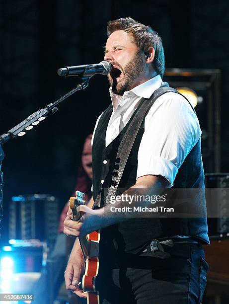 Randy Houser performs onstage during the "Country Nation" tour held at Verizon Wireless Amphitheater on July 12, 2014 in Irvine, California.