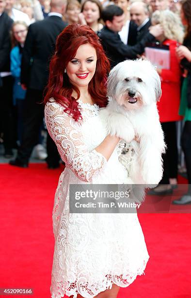 Ashleigh Bulter and Pudsey attend the World Premiere of "Pudsey The Dog: The Movie" at Vue West End on July 13, 2014 in London, England.