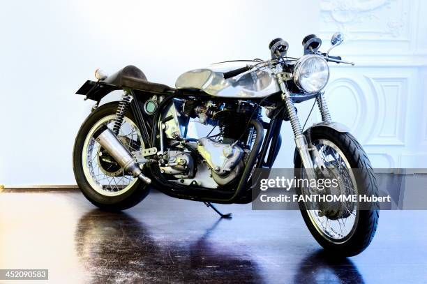 French Journalist and music critic Philippe Manoeuvre poses with the objects of the Rock'n'Roll auction sale Artcurial on October 28, 2013 in Paris,...