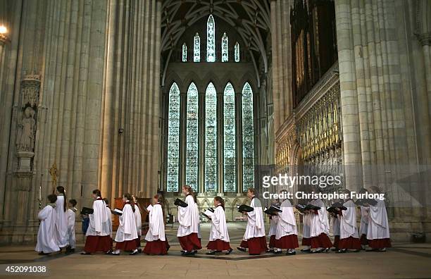The choir process through York Minster during a Eucharist Service attended by the Church of England Synod on July 13, 2014 in York, England. Members...