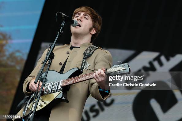 Adam Hastings Of The Bootleg Beatles Performs On Stage As John Lennon adam-hastings-of-the-bootleg-beatles-performs-on-stage-as-john-lennon