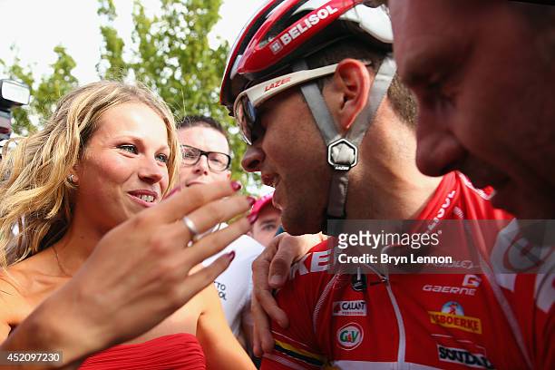 Tony Gallopin of France and Team Lotto Belisol kissing his girlfriend Marion Rousse after securing the yellow jersey and race lead on the ninth stage...