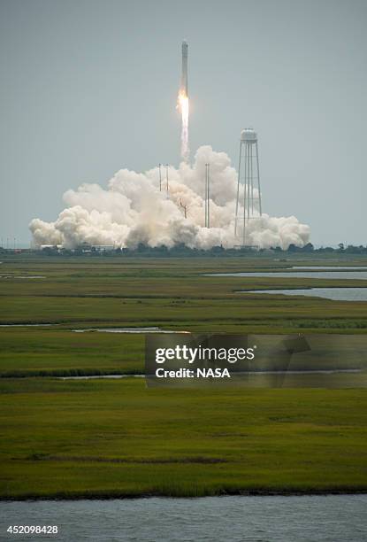 The Orbital Sciences Corporation Antares rocket, with the Cygnus spacecraft onboard, is pictured launching from Pad-0A on July 13 at NASA's Wallops...