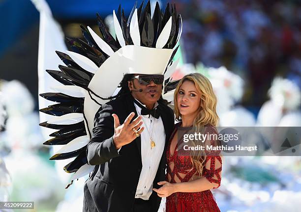 Musicians Carlinhos Brown and Shakira perform during the closing ceremony prior to the 2014 FIFA World Cup Brazil Final match between Germany and...