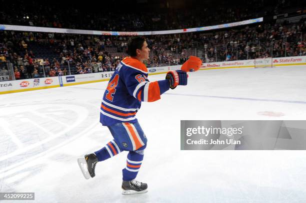 Nail Yakupov of the Edmonton Oilers celebrates his first hat trick during a game against the Vancouver Canucks on April 27, 2013 at Rexall Place in...