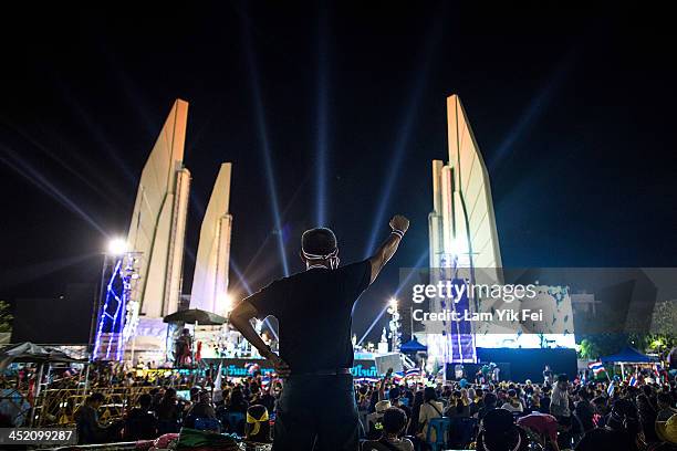 Anti-government protesters take part in a rally at Democracy Monument on November 26, 2013 in Bangkok, Thailand. The Prime Minister of Thailand,...