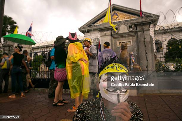 Anti-government protesters demonstrate outside the Ministry of Interior in a bid to oust the current government of Yingluck Shinawatra November 26,...