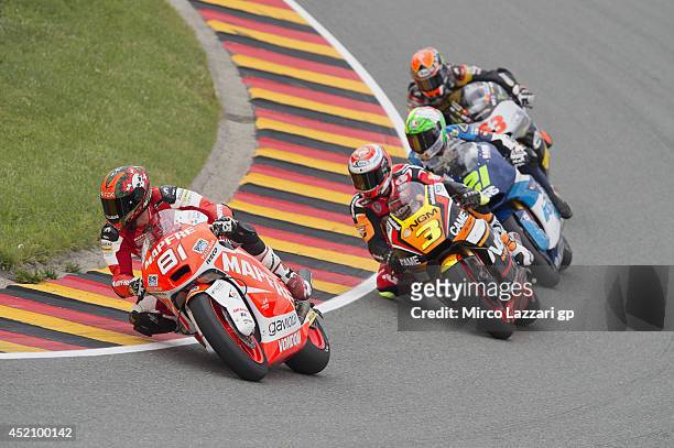 Jordi Torres of Spain and Mapfre Aspar Team Moto2 leads the field during the Moto2 race during the MotoGp of Germany - Race at Sachsenring Circuit on...