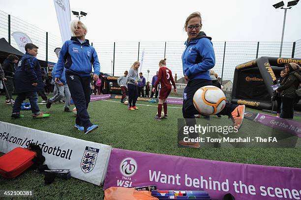 Cristina Torkilsen and Katie Wilkinson of Birmingham City Ladies FC show off their ball skills during the FA Girls Fanzone before the UEFA Womens U17...