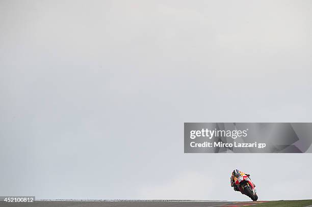 Dani Pedrosa of Spain and Repsol Honda Team heads down a straight during the MotoGP race during the MotoGp of Germany - Race at Sachsenring Circuit...