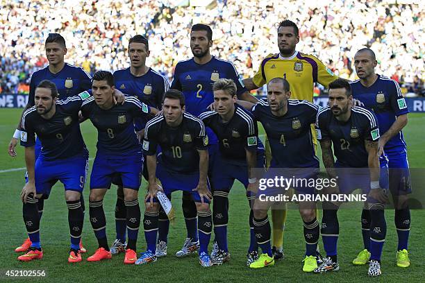 Argentina's national team Argentina's defender Marcos Rojo, Argentina's defender Martin Demichelis, Argentina's defender Ezequiel Garay, Argentina's...