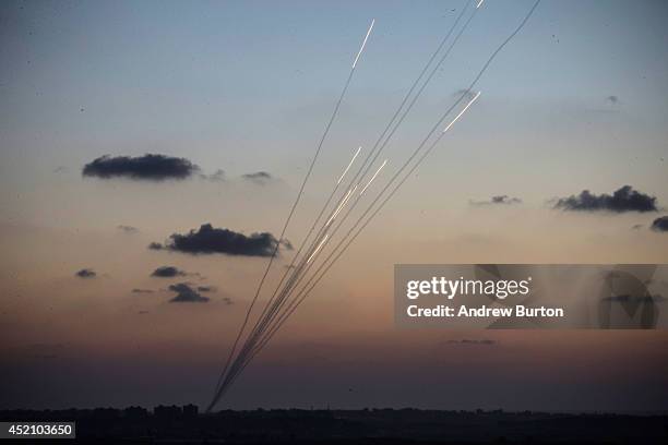 Rockets are fired from inside the Gaza strip towards Israel on the sixth day of Israel's operation 'Protective Edge' on July 13, 2014 as seen from...