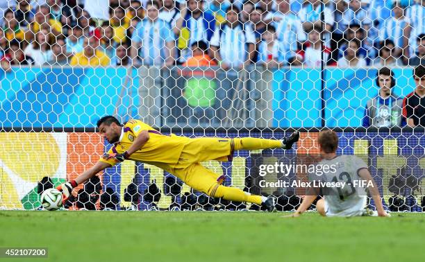 Sergio Romero of Argentina makes a save during the 2014 FIFA World Cup Brazil Final match between Germany and Argentina at Maracana on July 13, 2014...