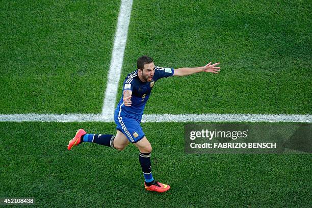 Argentina's forward Gonzalo Higuain gestures as he celebrates a dissallowed goal during the final football match between Germany and Argentina for...