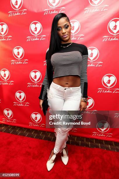 Joseline Hernandez from "VH1's "Love & Hip-Hop Atlanta", poses for red carpet photos for "A Mother's Love" stage play at the Rialto Center For The...