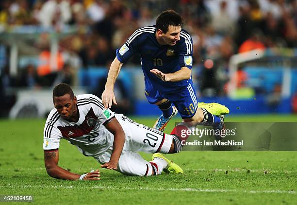 Jerome Boateng of Germany vies with Lionel Messi of Argentina during the 2014 World Cup final match between Germany and Argentina at The Maracana...